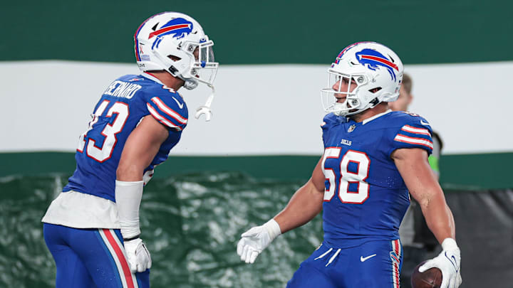 Sep 11, 2023; East Rutherford, New Jersey, USA; Buffalo Bills linebacker Matt Milano (58) reacts after his interception with linebacker Terrel Bernard (43) during the first half against the New York Jets at MetLife Stadium. Mandatory Credit: Vincent Carchietta-USA TODAY Sports