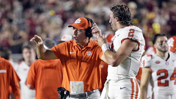 Oct 5, 2024; Tallahassee, Florida, USA; Clemson Tigers head coach Dabo Swinney talks with quarterback Cade Klubnik (2) during the first half against the Florida State Seminoles at Doak S. Campbell Stadium. Mandatory Credit: Melina Myers-Imagn Images