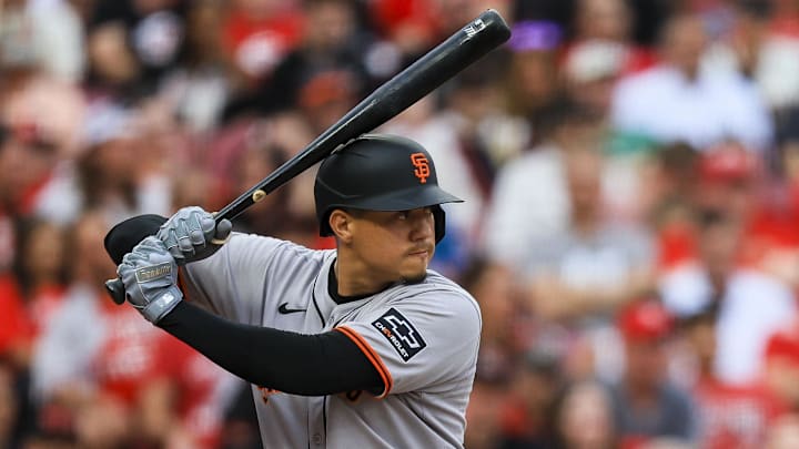 Mar 29, 2025; Cincinnati, Ohio, USA; San Francisco Giants first baseman Wilmer Flores (41) at bat in the ninth inning against the Cincinnati Reds at Great American Ball Park.