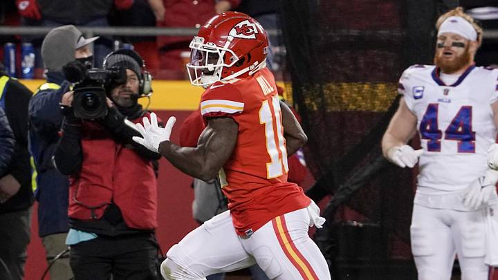 Jan 23, 2022; Kansas City, Missouri, USA; Kansas City Chiefs wide receiver Tyreek Hill (10) runs for a touchdown against the Buffalo Bills during an AFC Divisional playoff football game at GEHA Field at Arrowhead Stadium. Mandatory Credit: Denny Medley-USA TODAY Sports