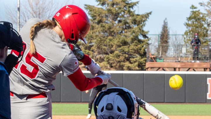 Nebraska catcher Jesse Farrell hits a home run against Omaha at Bowlin Stadium.