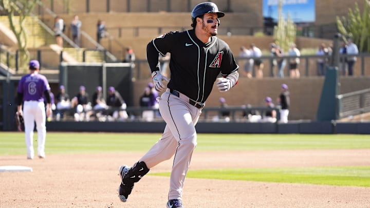 Arizona Diamondbacks' Nolan Arenado (28) rounds the bases after hitting a home run off Colorado Rockies pitcher Antonio Senzatela (49) in the second inning during a spring training game at Salt River Fields on Feb. 20, 2026, in Scottsdale. Arizona Diamondbacks' Nolan Arenado (28) rounds the bases after hitting a home run off Colorado Rockies pitcher Antonio Senzatela (49) in the second inning during a spring training game at Salt River Fields on Feb. 20, 2026, in Scottsdale.