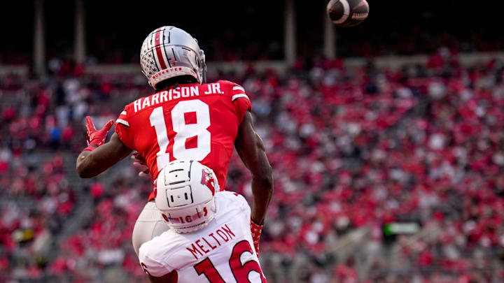 Ohio State Buckeyes wide receiver Marvin Harrison Jr. (18) is defended by Rutgers Scarlet Knights Ohio State Buckeyes wide receiver Marvin Harrison Jr. (18) is defended by Rutgers Scarlet Knights