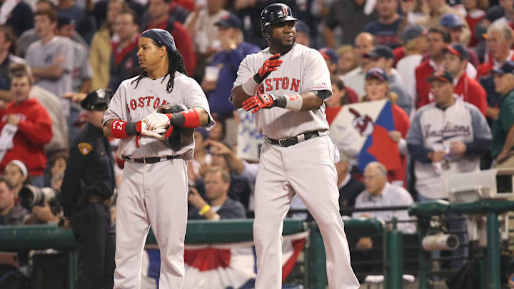 Oct 18, 2007; Cleveland, OH, USA; Boston Red Sox left fielder (24) Manny Ramirez (left) and designated hitter (34) David Ortiz (right). Mandatory Credit: Tom Szczerbowski-Imagn Images