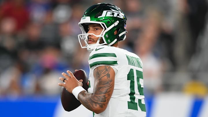 Aug 16, 2025; East Rutherford, New Jersey, USA; New York Jets quarterback Adrian Martinez (15) drops back to pass against the New York Giants during the first half at MetLife Stadium. Mandatory Credit: Rich Barnes-Imagn Images Aug 16, 2025; East Rutherford, New Jersey, USA; New York Jets quarterback Adrian Martinez (15) drops back to pass against the New York Giants during the first half at MetLife Stadium. Mandatory Credit: Rich Barnes-Imagn Images