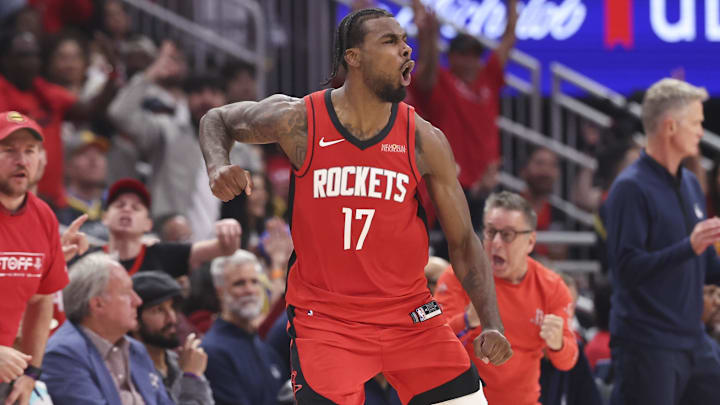 Apr 23, 2025; Houston, Texas, USA; Houston Rockets forward Tari Eason (17) reacts after making a basket during the second quarter during game two of the first round for the 2024 NBA Playoffs against the Golden State Warriors at Toyota Center. Mandatory Credit: Troy Taormina-Imagn Images