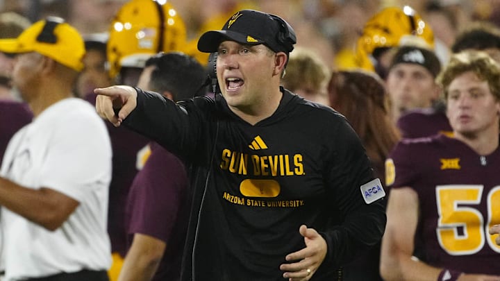 Arizona State head coach Kenny Dillingham calls out to his players against Wyoming during a game at Sun Devil Stadium.