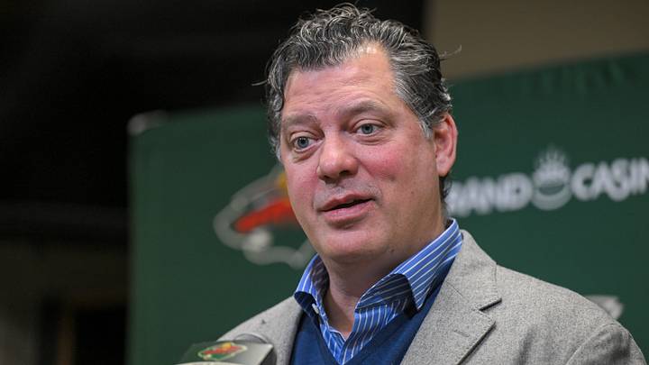 Dec 13, 2025; Saint Paul, Minnesota, USA;  Minnesota Wild general manager Bill Guerin addresses the media about acquiring defenseman Quinn Hughes via trade from the Vancouver Canucks before a game against the Ottawa Senators at Grand Casino Arena. Mandatory Credit: Nick Wosika-Imagn Images