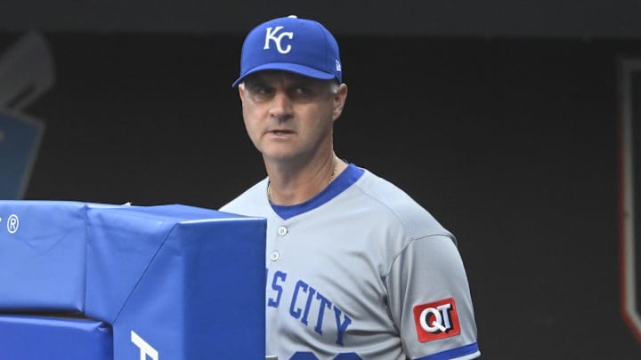 Sep 10, 2025; Cleveland, Ohio, USA; Kansas City Royals manager Matt Quatraro (33) looks on from the dugout in the second inning against the Cleveland Guardians at Progressive Field. Mandatory Credit: David Richard-Imagn Images