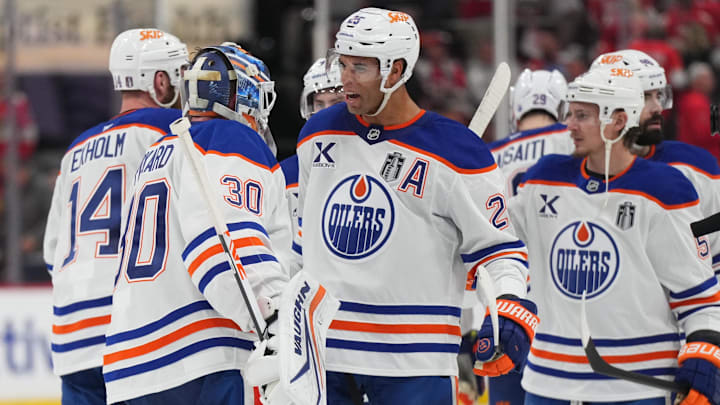 Jun 12, 2025; Sunrise, Florida, USA; Edmonton Oilers defenseman Darnell Nurse (25) celebrates the win with goaltender Calvin Pickard (30) after overtime against the Florida Panthers in game four of the 2025 Stanley Cup Final at Amerant Bank Arena. Mandatory Credit: Jim Rassol-Imagn Images