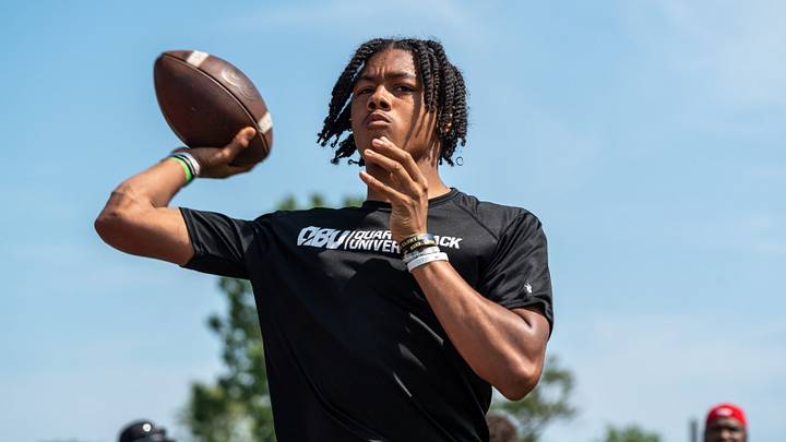 Donald Tabron II, 16, a quarterback at Cass Technical High School, throws a football during a private workout in Detroit on Saturday, June 21, 2025. Donald Tabron II, 16, a quarterback at Cass Technical High School, throws a football during a private workout in Detroit on Saturday, June 21, 2025.