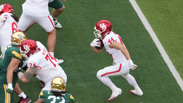 Nov 29, 2025; Waco, Texas, USA;  Houston Cougars running back Dean Connors (44) carries the ball against the Baylor Bears during the first half at McLane Stadium. Mandatory Credit: Chris Jones-Imagn Images