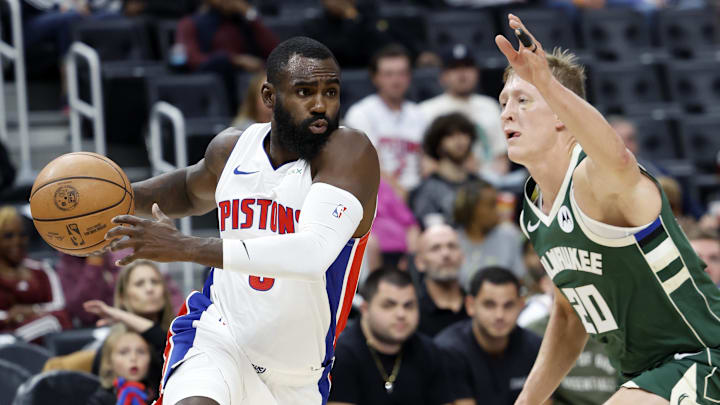 Oct 6, 2024; Detroit, Michigan, USA;  Detroit Pistons guard Malik Beasley (5) dribbles on Milwaukee Bucks guard AJ Green (20) in the first half at Little Caesars Arena. Mandatory Credit: Rick Osentoski-Imagn Images