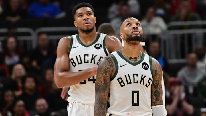 Oct 14, 2024; Milwaukee, Wisconsin, USA; Milwaukee Bucks forward Giannis Antetokounmpo (34) and guard Damian Lillard (0) look on in the second quarter against the Chicago Bulls at Fiserv Forum. Mandatory Credit: Benny Sieu-Imagn Images Oct 14, 2024; Milwaukee, Wisconsin, USA; Milwaukee Bucks forward Giannis Antetokounmpo (34) and guard Damian Lillard (0) look on in the second quarter against the Chicago Bulls at Fiserv Forum. Mandatory Credit: Benny Sieu-Imagn Images