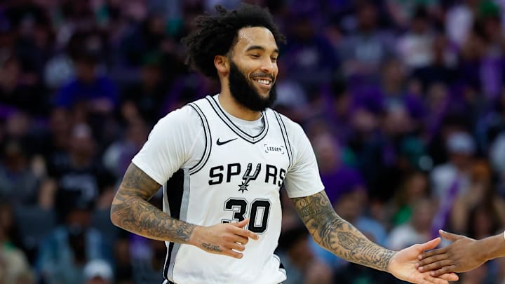 Mar 17, 2026; Sacramento, California, USA; San Antonio Spurs forward Julian Champagnie (30) celebrates after scoring during the third quarter against the Sacramento Kings at Golden 1 Center. Mandatory Credit: Sergio Estrada-Imagn Images