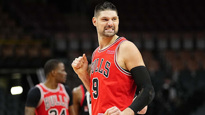 Feb 3, 2022; Toronto, Ontario, CAN; Chicago Bulls center Nikola Vucevic (9) reacts after a play against the Toronto Raptors during the second half at Scotiabank Arena. Mandatory Credit: John E. Sokolowski-Imagn Images
