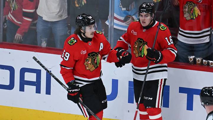 Oct 13, 2026; Chicago, Illinois, USA;  Chicago Blackhawks left wing Tyler Bertuzzi (59) celebrates his goal against the Pittsburgh Penguins with center Anton Frondell (16).  Mandatory Credit: Matt Marton-Imagn Images
