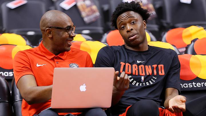Jan 13, 2018; Toronto, Ontario, CAN; Toronto Raptors     assistant coach Patrick Mutombo (left) and Toronto Raptors forward OG Anunoby (right) talk prior to a game against the Golden State Warriors at the Air Canada Centre. Mandatory Credit: John E. Sokolowski-USA TODAY Sports