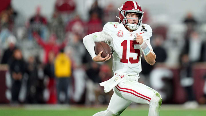 Alabama's Ty Simpson (15) rushes in the second half of the College Football Playoff game between the University of Oklahoma Sooners (OU) and the Alabama Crimson Tide at the Gaylord Family - Oklahoma Memorial Stadium in Norman, Okla., Friday Dec. 19, 2025.