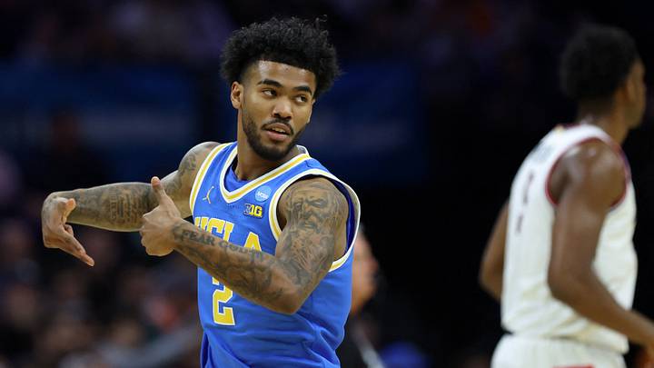 Mar 22, 2026; Philadelphia, PA, USA; UCLA Bruins guard Donovan Dent (2) reacts UConn Huskies in the first half during a second round game of the men's 2026 NCAA Tournament at Xfinity Mobile Arena.