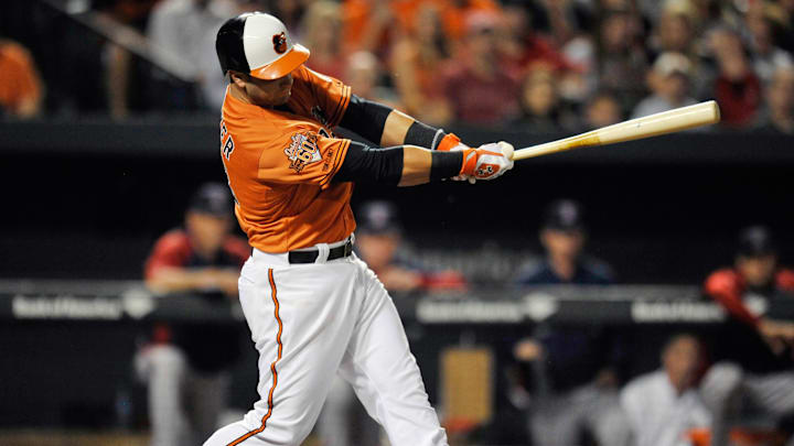 Sep 20, 2014; Baltimore, MD, USA; Baltimore Orioles first baseman Christian Walker (18) singles in the second inning against the Boston Red Sox at Oriole Park at Camden Yards. Mandatory Credit: Joy R. Absalon-Imagn Images Sep 20, 2014; Baltimore, MD, USA; Baltimore Orioles first baseman Christian Walker (18) singles in the second inning against the Boston Red Sox at Oriole Park at Camden Yards. Mandatory Credit: Joy R. Absalon-Imagn Images