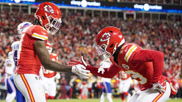 Dec 10, 2023; Kansas City, Missouri, USA; Kansas City Chiefs wide receiver Rashee Rice (4) celebrates with wide receiver Kadarius Toney (19) after scoring against the Buffalo Bills during the first half at GEHA Field at Arrowhead Stadium. Mandatory Credit: Denny Medley-USA TODAY Sports