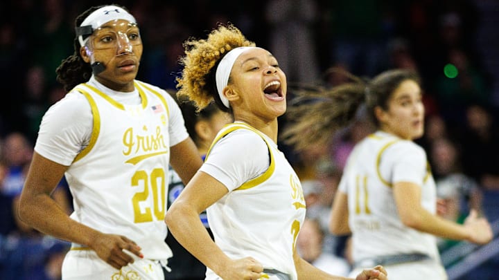 Notre Dame guard Hannah Hidalgo, center, celebrates making a three point shot during a NCAA women's basketball game between No. 1 Notre Dame and No. 11 Duke at Purcell Pavilion on Monday, Feb. 17, 2025, in South Bend.