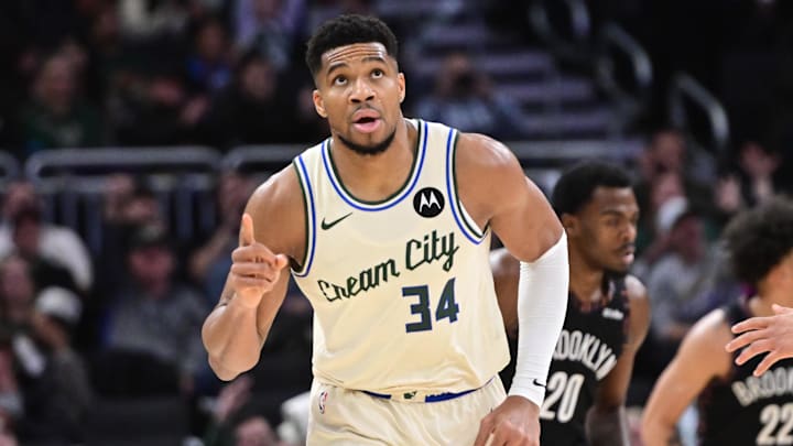 Nov 29, 2025; Milwaukee, Wisconsin, USA; Milwaukee Bucks forward Giannis Antetokounmpo (34) reacts after scoring his 21,000th career point in the third quarter against the Brooklyn Nets at Fiserv Forum. Mandatory Credit: Benny Sieu-Imagn Images