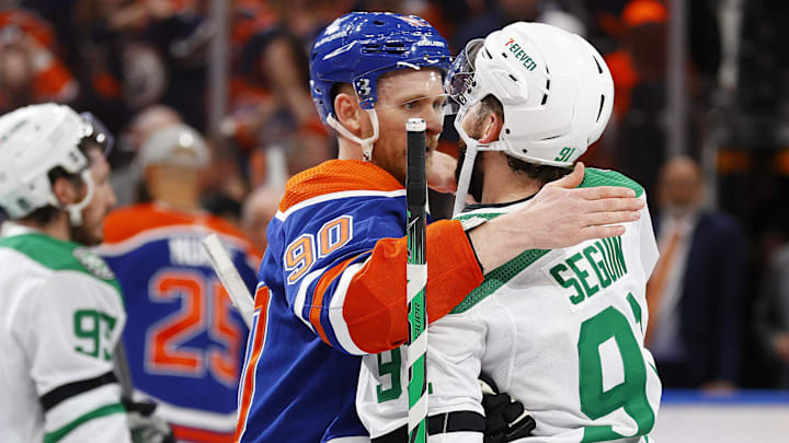 Jun 2, 2024; Edmonton, Alberta, CAN; Edmonton Oilers forward Corey Perry (90) shakes hands with Dallas Stars forward Tyler Sequin (91) after winning the Western Conference Championship in game six of the Western Conference Final of the 2024 Stanley Cup Playoffs at Rogers Place. Mandatory Credit: Perry Nelson-Imagn Images