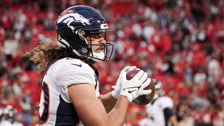 Oct 12, 2023; Kansas City, Missouri, USA; Denver Broncos tight end Greg Dulcich (80) warms up against the Kansas City Chiefs prior to a game at GEHA Field at Arrowhead Stadium.  