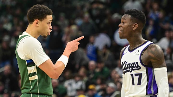 Nov 1, 2025; Milwaukee, Wisconsin, USA;  Milwaukee Bucks guard Ryan Rollins (13) gestures toward Sacramento Kings guard Dennis Schroder (17) in the first quarter at Fiserv Forum. Mandatory Credit: Benny Sieu-Imagn Images