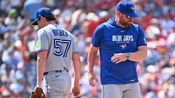 Aug 9, 2026: Toronto Blue Jays manager John Schneider (14) take the ball from pitcher Shane Bieber (57) against the Philadelphia Phillies during the sixth inning at Citizens Bank Park. Credit: Eric Hartline-Imagn Images Aug 9, 2026: Toronto Blue Jays manager John Schneider (14) take the ball from pitcher Shane Bieber (57) against the Philadelphia Phillies during the sixth inning at Citizens Bank Park. Credit: Eric Hartline-Imagn Images