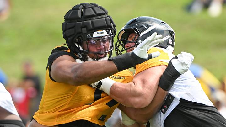 Pittsburgh Steelers defensive tackle Derrick Harmon (99) battles center Zach Frazier (54) Pittsburgh Steelers defensive tackle Derrick Harmon (99) battles center Zach Frazier (54)