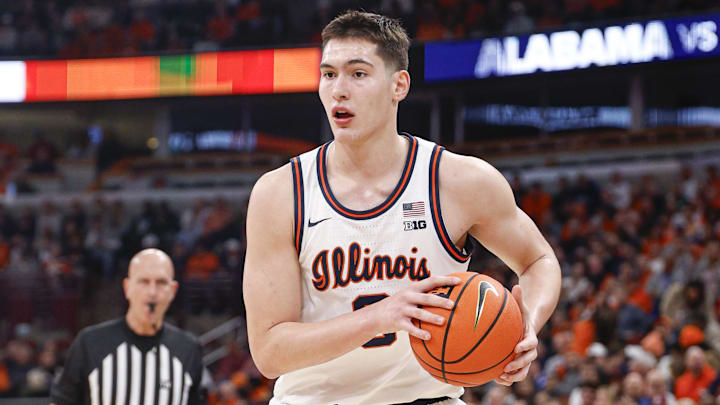 Nov 19, 2025; Chicago, Illinois, USA; Illinois Fighting Illini forward David Mirkovic (0) looks to pass the ball against the Alabama Crimson Tide during the first half at United Center. Mandatory Credit: Kamil Krzaczynski-Imagn Images