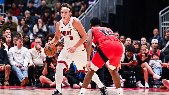 Oct 3, 2026; Quebec City, Quebec, CAN; Miami Heat guard Pelle Larsson (9) dribbles the ball against Toronto Raptors guard Malachi Smith (18) during the second quarter at Videotron Centre. Mandatory Credit: David Kirouac-Imagn Images Oct 3, 2026; Quebec City, Quebec, CAN; Miami Heat guard Pelle Larsson (9) dribbles the ball against Toronto Raptors guard Malachi Smith (18) during the second quarter at Videotron Centre. Mandatory Credit: David Kirouac-Imagn Images