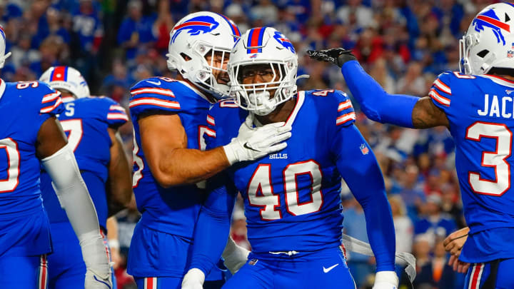Sep 19, 2022; Orchard Park, New York, USA; Buffalo Bills linebacker Von Miller (40) and Buffalo Bills linebacker Matt Milano (58) react to making a play during the first half against the Tennessee Titans at Highmark Stadium. Mandatory Credit: Gregory Fisher-USA TODAY Sports