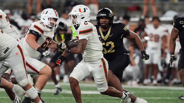 Sep 18, 2026; Winston-Salem, North Carolina, USA;  Miami (FL) Hurricanes running back Girard Pringle Jr. (0) runs for yardage against the Wake Forest Demon Deacons during the second half at Allegacy Federal Credit Union Stadium.  Mandatory Credit: Jim Dedmon-Imagn Images