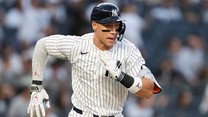 Apr 17, 2026; Bronx, New York, USA; New York Yankees right fielder Aaron Judge (99) doubles during the first inning against the Kansas City Royals at Yankee Stadium. Mandatory Credit: Vincent Carchietta-Imagn Images