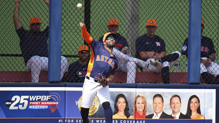 Mar 5, 2025; West Palm Beach, Florida, USA; Houston Astros player Jose Altuve (27) fields the ball against the St. Louis Cardinals during the third inning at CACTI Park of the Palm Beaches. Mar 5, 2025; West Palm Beach, Florida, USA; Houston Astros player Jose Altuve (27) fields the ball against the St. Louis Cardinals during the third inning at CACTI Park of the Palm Beaches.