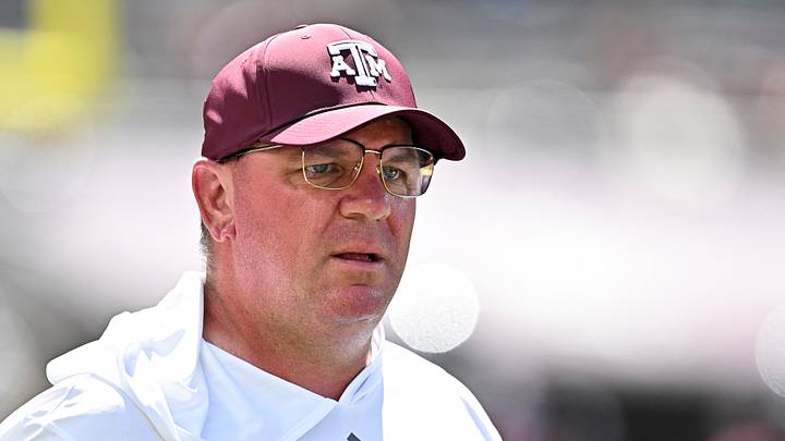 Texas A&M Aggies head coach Mike Elko walk on the field prior to the game against the Kentucky Wildcats at Kyle Field.