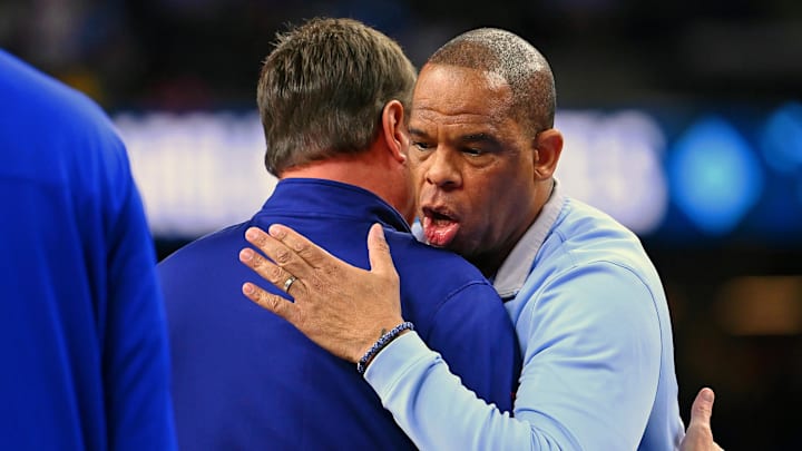 Apr 4, 2022; New Orleans, LA, USA; North Carolina Tar Heels head coach Hubert Davis hugs Kansas Jayhawks head coach Bill Self before the game during the 2022 NCAA men's basketball tournament Final Four championship game at Caesars Superdome. Mandatory Credit: Bob Donnan-Imagn Images Apr 4, 2022; New Orleans, LA, USA; North Carolina Tar Heels head coach Hubert Davis hugs Kansas Jayhawks head coach Bill Self before the game during the 2022 NCAA men's basketball tournament Final Four championship game at Caesars Superdome. Mandatory Credit: Bob Donnan-Imagn Images