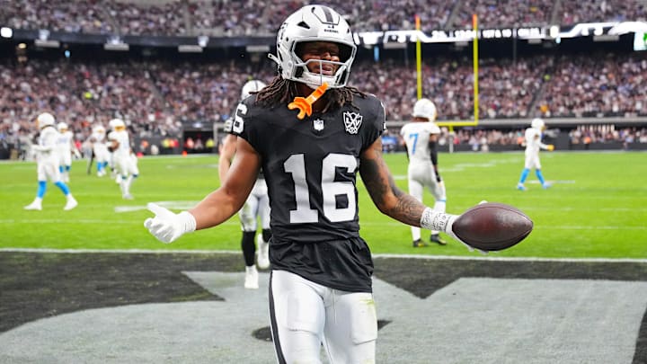 Jan 5, 2025; Paradise, Nevada, USA; Las Vegas Raiders wide receiver Jakobi Meyers (16) celebrates after scoring a touchdown against the Los Angeles Chargers during the second quarter at Allegiant Stadium. Mandatory Credit: Stephen R. Sylvanie-Imagn Images