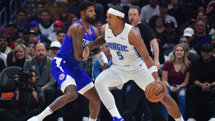 Oct 31, 2023; Los Angeles, California, USA;  Orlando Magic forward Paolo Banchero (5) and Paul George (13)