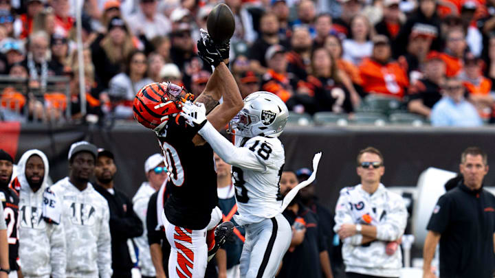 Las Vegas Raiders cornerback Jack Jones (18) knocks the ball away from Cincinnati Bengals wide receiver Andrei Iosivas (80) in the fourth quarter of the NFL game at Paycor Stadium in Cincinnati on Sunday, Nov. 3, 2024. Las Vegas Raiders cornerback Jack Jones (18) knocks the ball away from Cincinnati Bengals wide receiver Andrei Iosivas (80) in the fourth quarter of the NFL game at Paycor Stadium in Cincinnati on Sunday, Nov. 3, 2024.