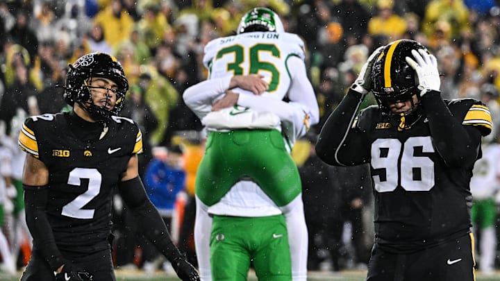 Nov 8, 2025; Iowa City, Iowa, USA; Iowa Hawkeyes defensive back TJ Hall (2) and defensive lineman Bryce Hawthorne (96) react after Oregon Ducks kicker Atticus Sappington (36) kicks the game winning field near the end of the fourth quarter at Kinnick Stadium. Mandatory Credit: Jeffrey Becker-Imagn Images Nov 8, 2025; Iowa City, Iowa, USA; Iowa Hawkeyes defensive back TJ Hall (2) and defensive lineman Bryce Hawthorne (96) react after Oregon Ducks kicker Atticus Sappington (36) kicks the game winning field near the end of the fourth quarter at Kinnick Stadium. Mandatory Credit: Jeffrey Becker-Imagn Images
