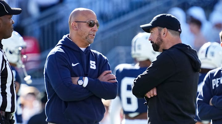 Ohio State Buckeyes head coach Ryan Day talks to Penn State Nittany Lions head coach James Franklin prior to the NCAA football game at Beaver Stadium in University Park, Pa. on Saturday, Nov. 2, 2024.