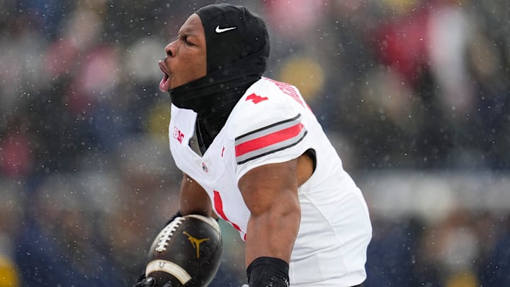 Ohio State Buckeyes cornerback Davison Igbinosun (1) celebrates an interception during the NCAA football game against the Michigan Wolverines at Michigan Stadium in Ann Arbor, Mich. on Nov. 29, 2025. Ohio State won 27-9.