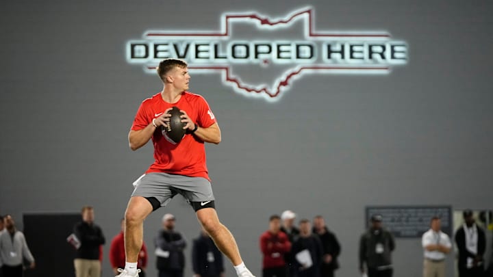 Ohio State Buckeyes quarterback Will Howard drops back to pass during the pro day for NFL scouts at the Woody Hayes Athletic Cente on March 26, 2025. Ohio State Buckeyes quarterback Will Howard drops back to pass during the pro day for NFL scouts at the Woody Hayes Athletic Cente on March 26, 2025.