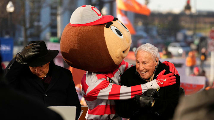 Ohio State mascot Brutus interacts with Lee Corso on the set of ESPN College GameDay prior to the College Football Playoff first round game between the Ohio State Buckeyes and Tennessee Volunteers in Columbus on Dec. 21, 2024.