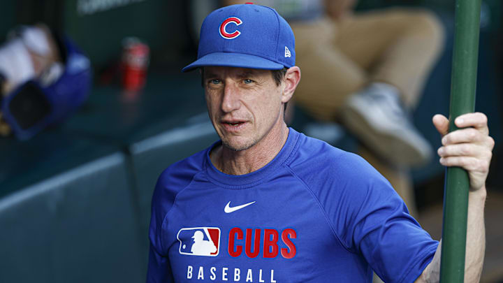 Jul 3, 2025; Chicago, Illinois, USA; Chicago Cubs manager Craig Counsell (11) stands in the dugout before a baseball game against the Cleveland Guardians at Wrigley Field